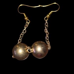 Recovered dangling earrings gold tone ball on gold tone chain. 20